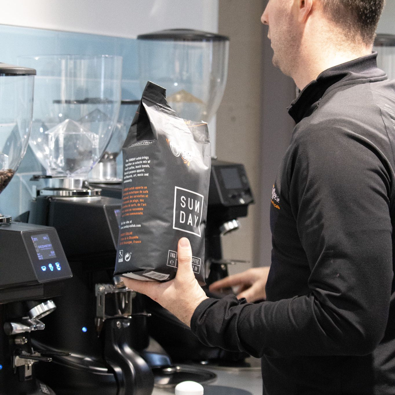 Matt ensuring our coffee grinders are topped up with latest roast from 'Sunday Coffee'.